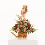 Mother's Day floral arrangement with preserved flower figurine