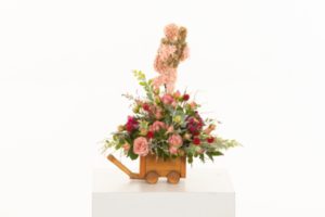 Mother's Day floral arrangement with preserved flower figurine